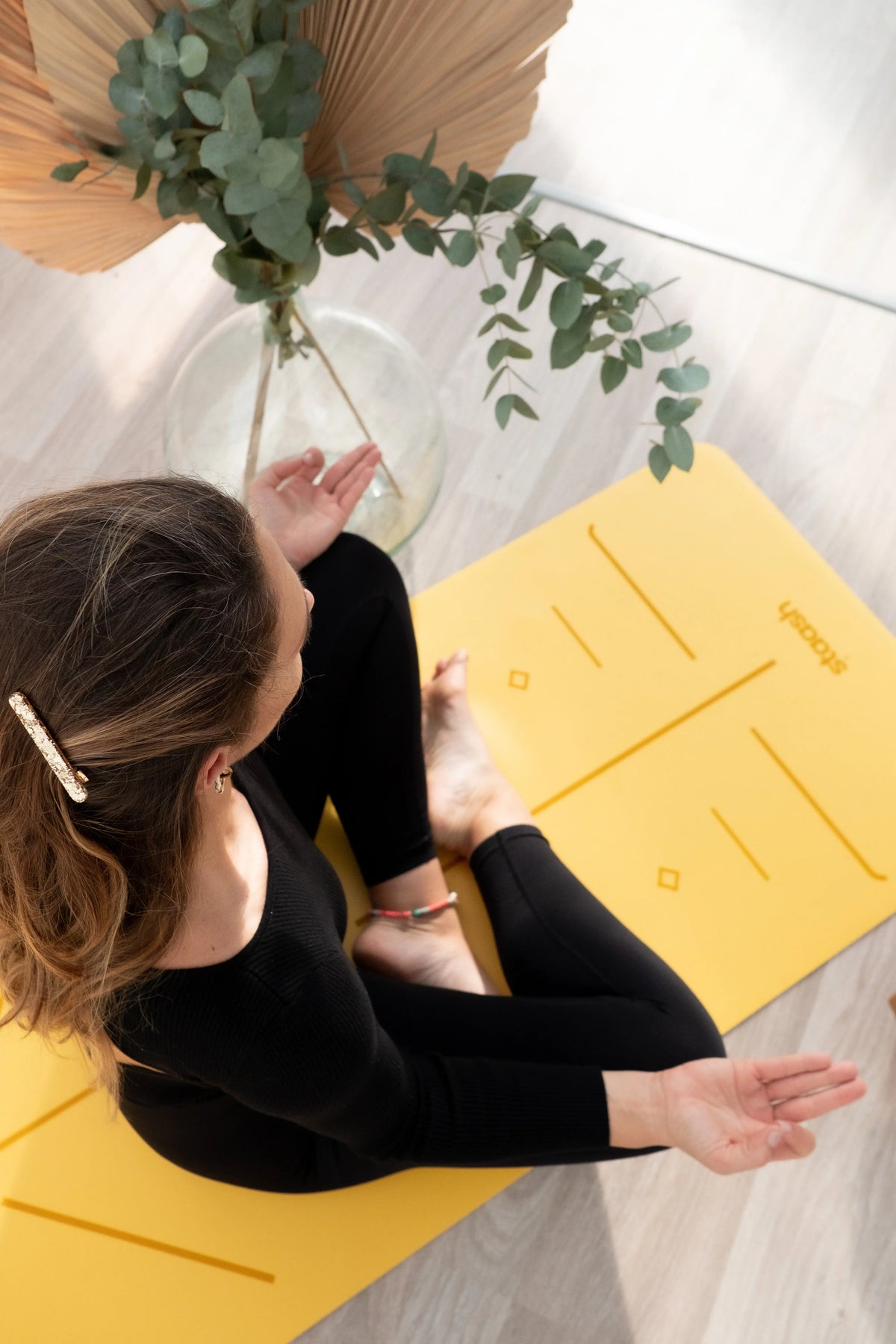 Yoga at home on a STAASH mat in Saffron #color-sunshine-yellow